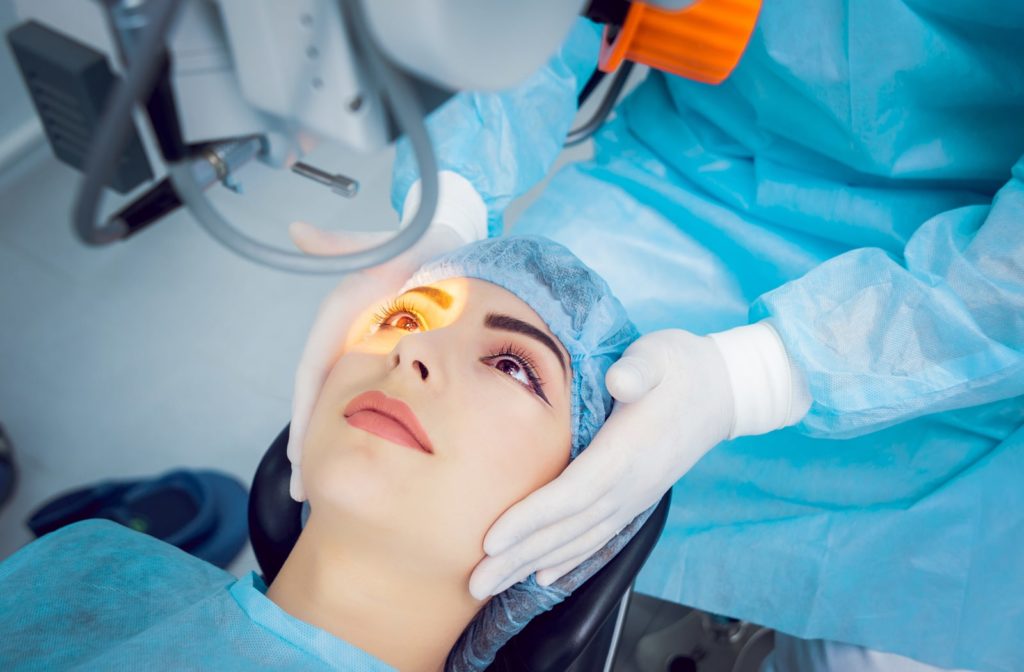 A woman preparing for cataract surgery with the surgeon